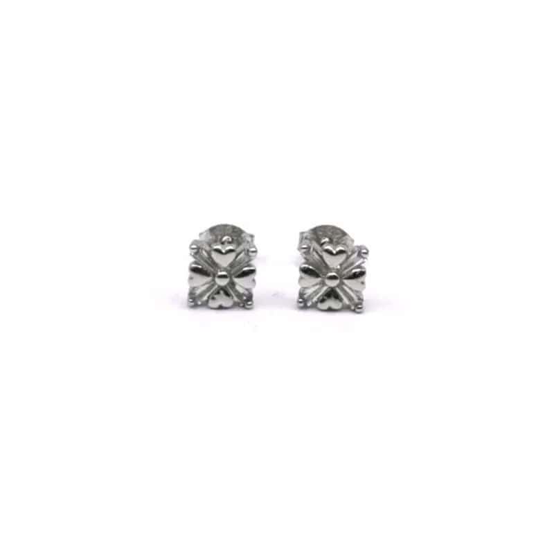 Pendientes de corazón de plata con piedras blancas